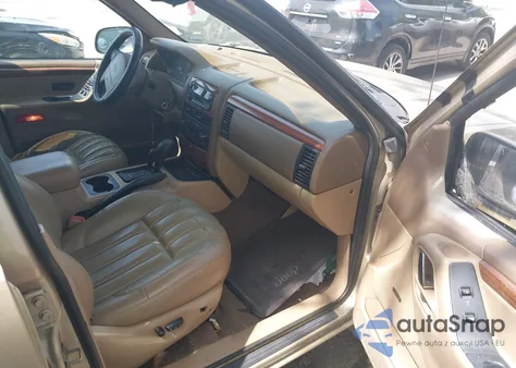 1999 Jeep Grand Cherokee Limited z USA, uszkodzony, nr VIN 1J4GW68S3XC580949